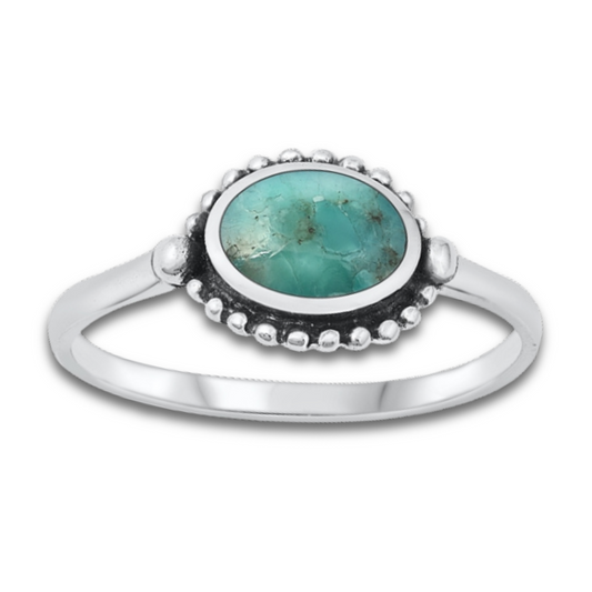 Turquoise Oval Bali Ring on a white background.