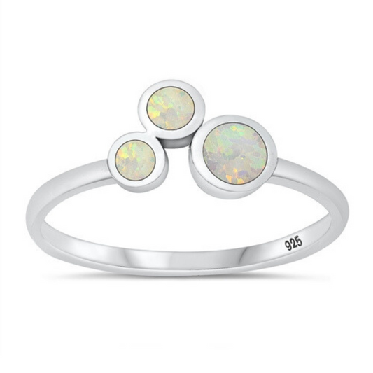 White Lab Opal 3 Stone Ring on a white background.
