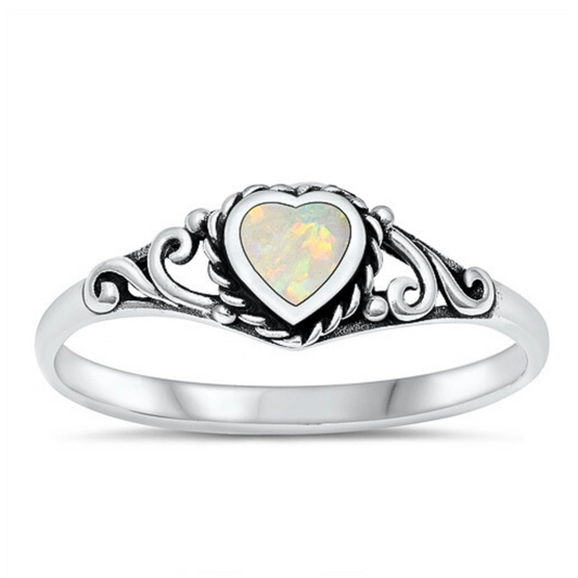 White Opal Heart Ring with Detail on a white background.