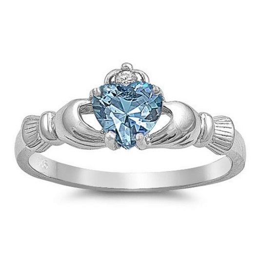 Aquamarine CZ Claddagh Ring on a white background.