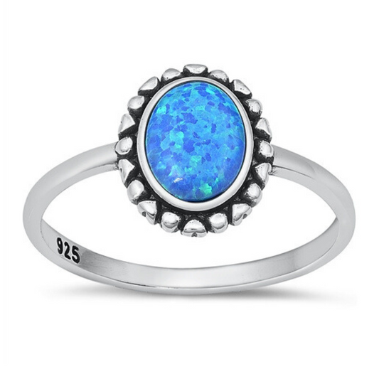 Blue Lab Opal Silver Bali Ring on a white background.