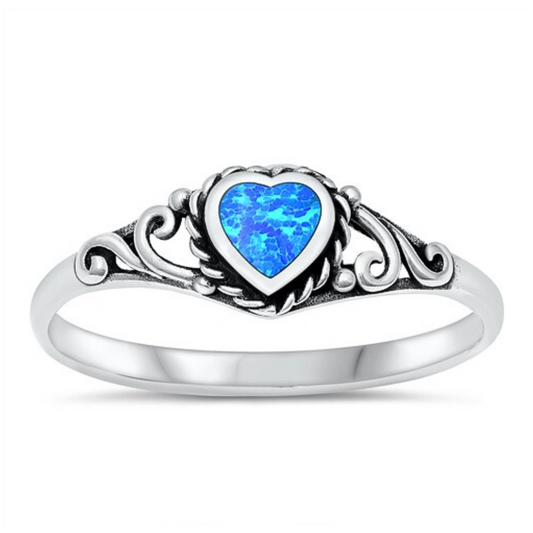 Blue Opal Heart Ring with Detail on a white background.