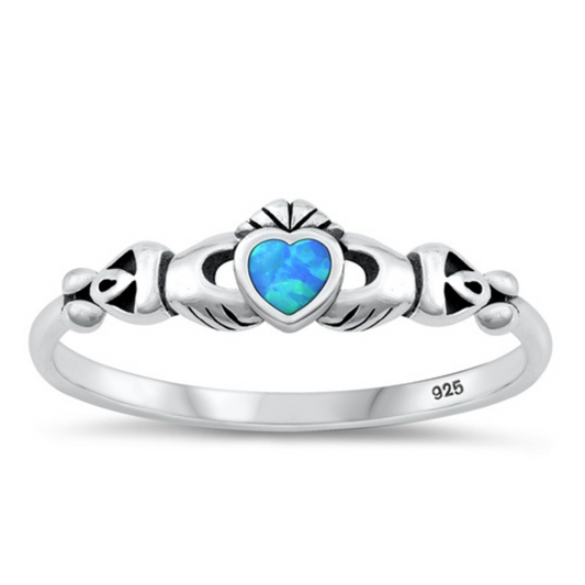 Blue Opal Tiny Claddagh Ring on a white background.