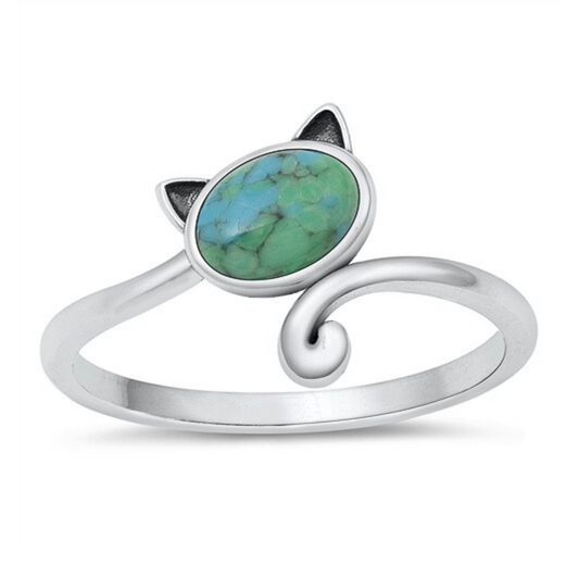 Cat with Turquoise Ring on a white background.