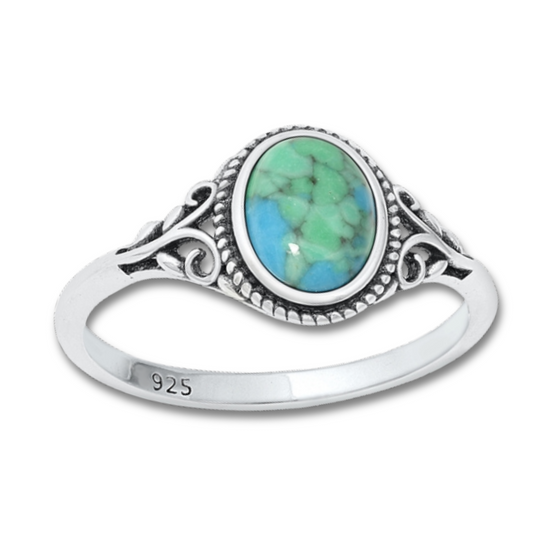 Oval Turquoise Ring on a white background.
