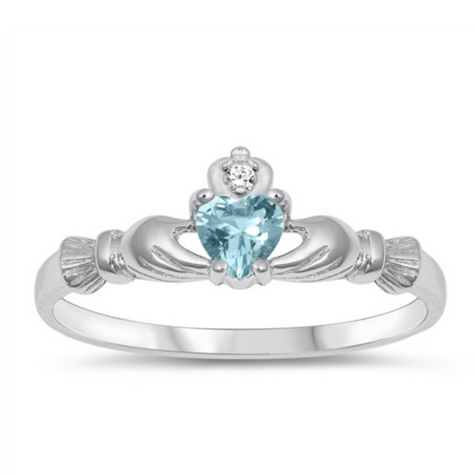 Small Aquamarine CZ Claddagh Ring on a white background.