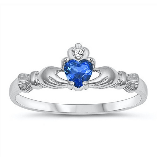 Small Sapphire CZ Claddagh Ring on a white background.
