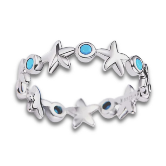 Starfish Blue Zircon Infinity Ring on a white background.