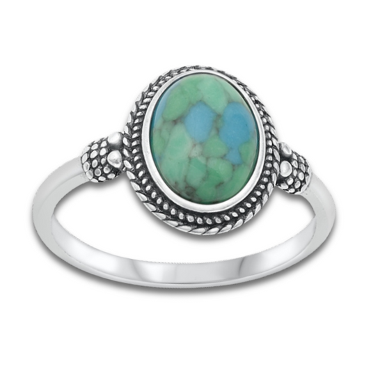 Turquoise Oval Ring on a white background.